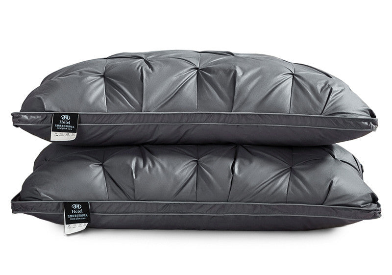 A Pair Of Feather Pillows And White Goose Single Neck Guards