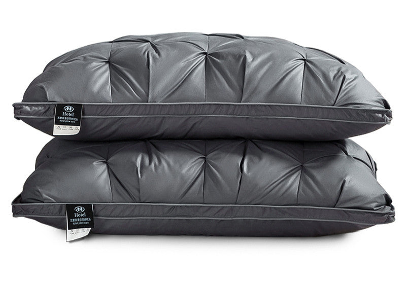 A Pair Of Feather Pillows And White Goose Single Neck Guards