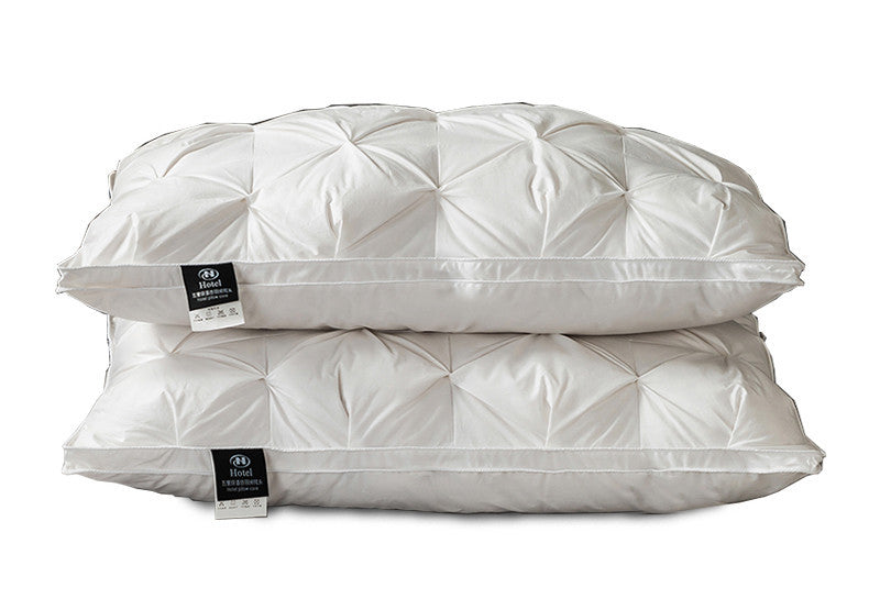 A Pair Of Feather Pillows And White Goose Single Neck Guards
