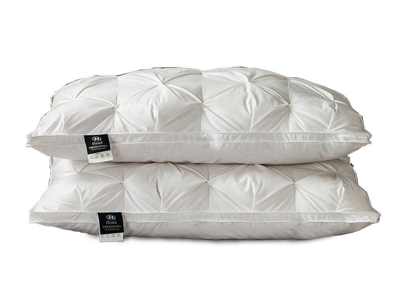 A Pair Of Feather Pillows And White Goose Single Neck Guards